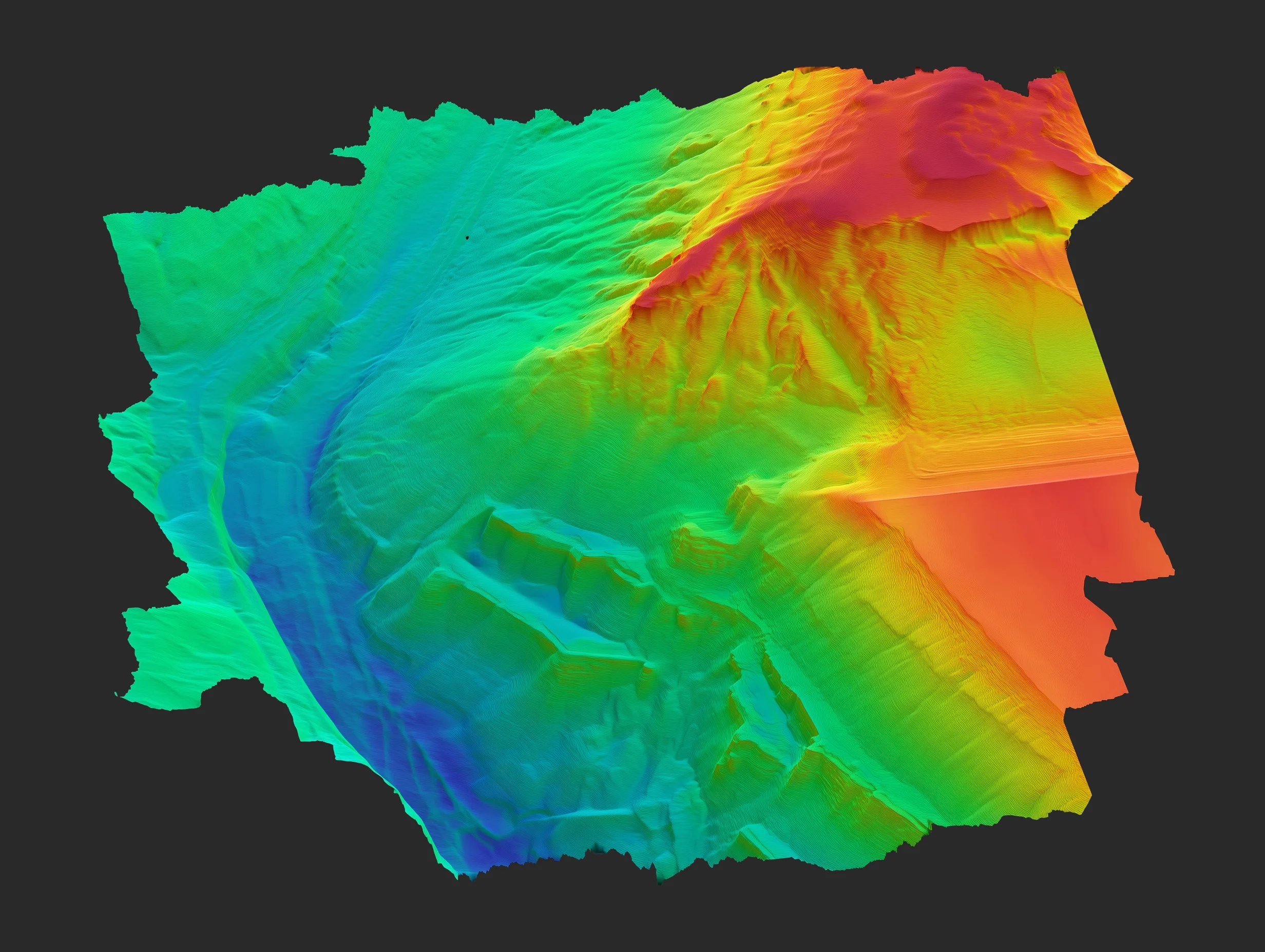 Modèle numérique de terrain en fausses couleurs, du bleu des points bas au rouge des points hauts.