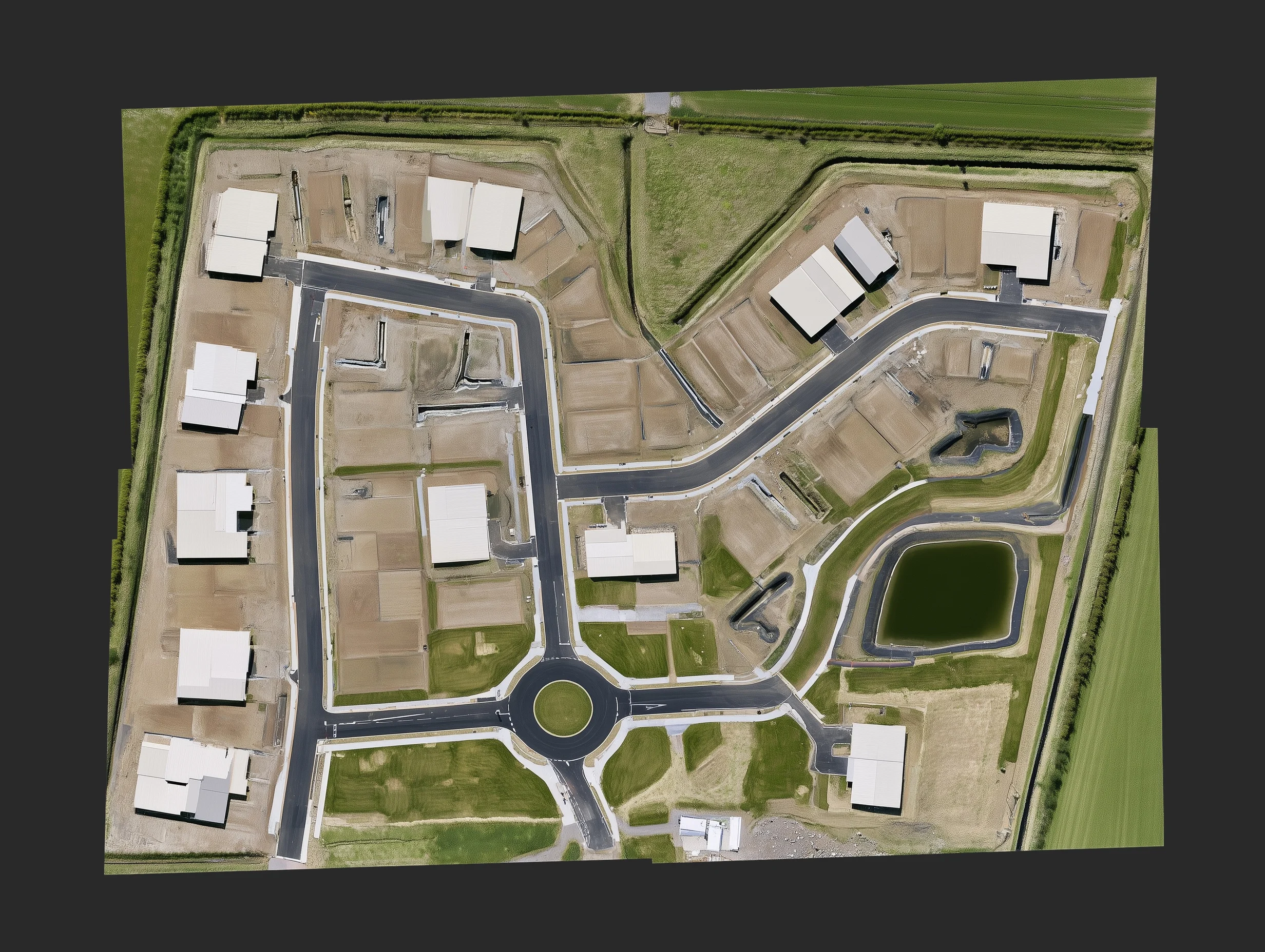 Orthophotographie d'un chantier de lotissement, vue verticale continue et redressée du sol.